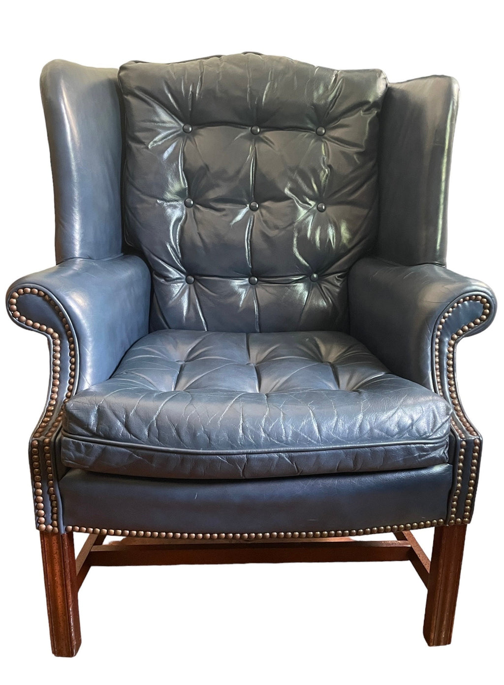 Leather Wingback — Armchair and Ottoman