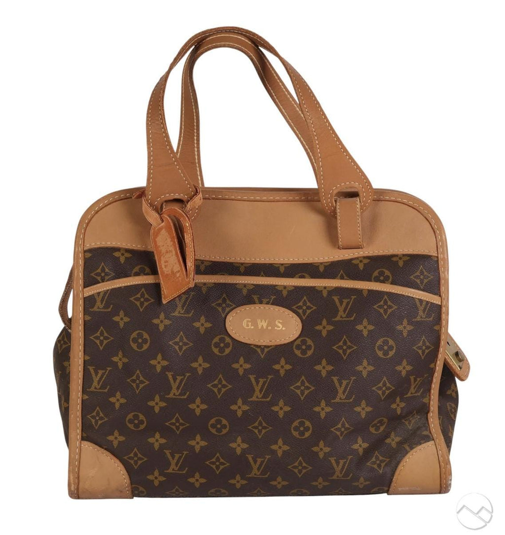 Louis Vuitton — Travel Bag