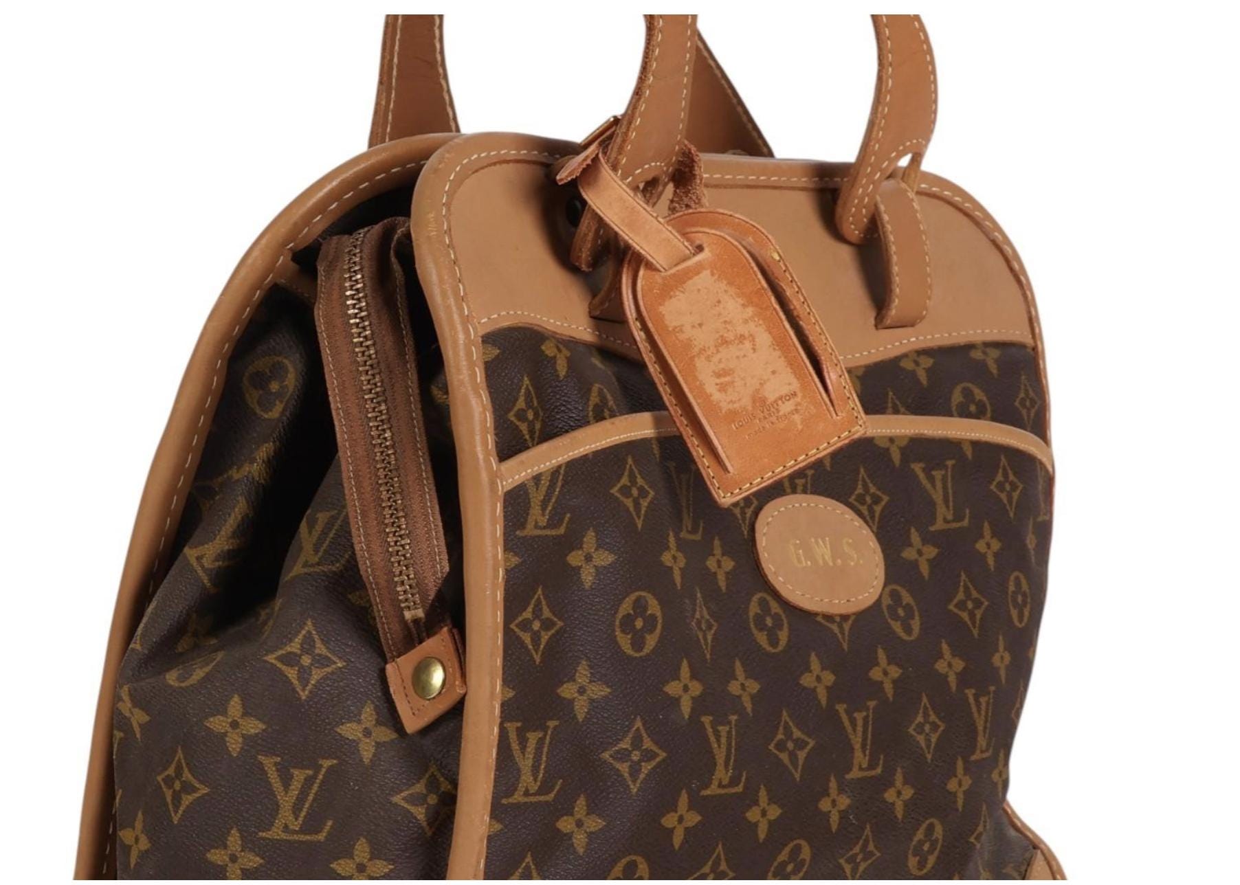 Louis Vuitton — Travel Bag